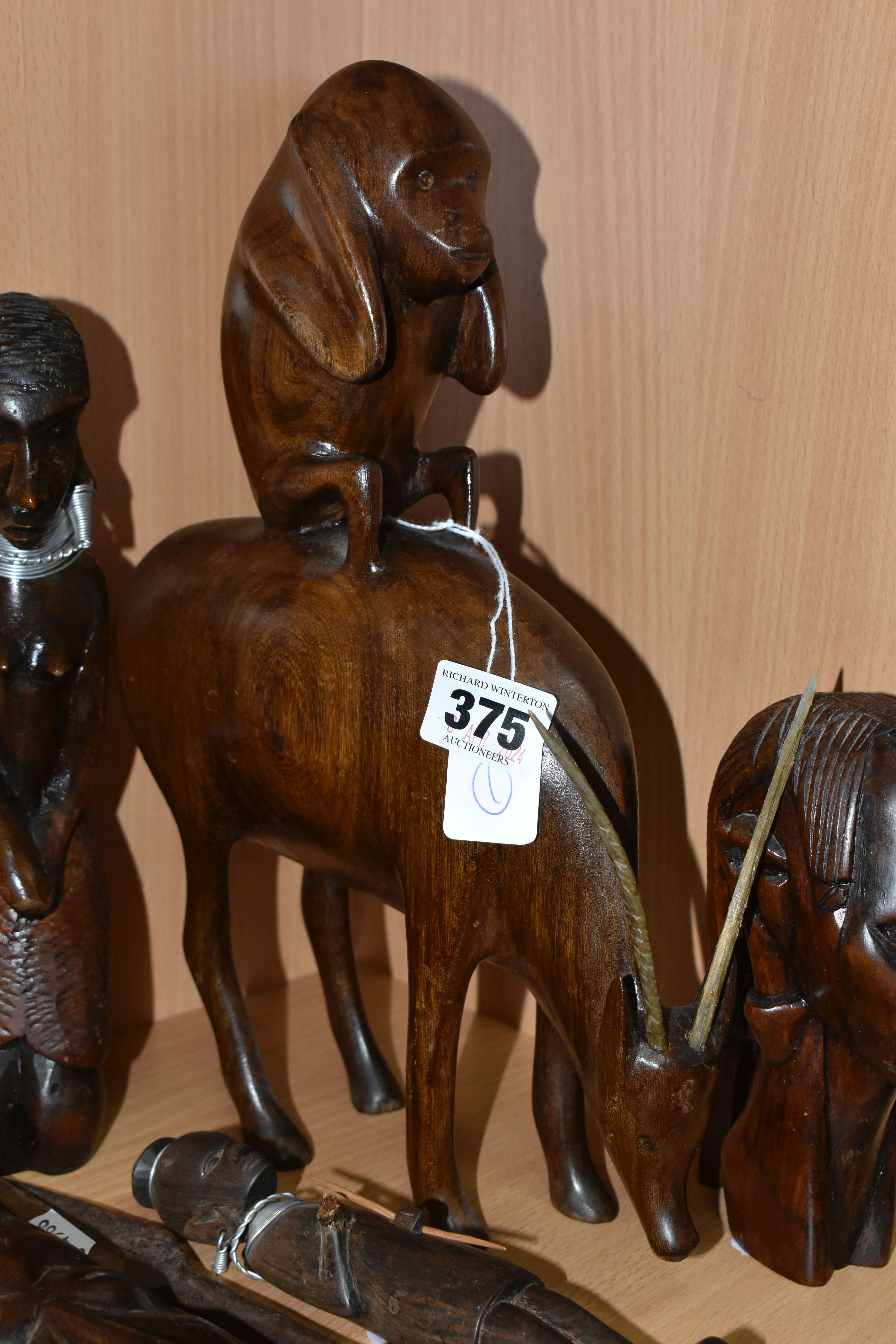 A GROUP OF CARVED HARDWOOD TRIBAL FIGURES, comprising ten carved wooden souvenir figures of animals, - Image 2 of 9