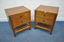 A PAIR OF REPRODUCTION HARDWOOD TWO DRAWER BEDSIDE CHESTS, on block legs, united by an undershelf,