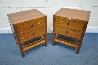 A PAIR OF REPRODUCTION HARDWOOD TWO DRAWER BEDSIDE CHESTS, on block legs, united by an undershelf,