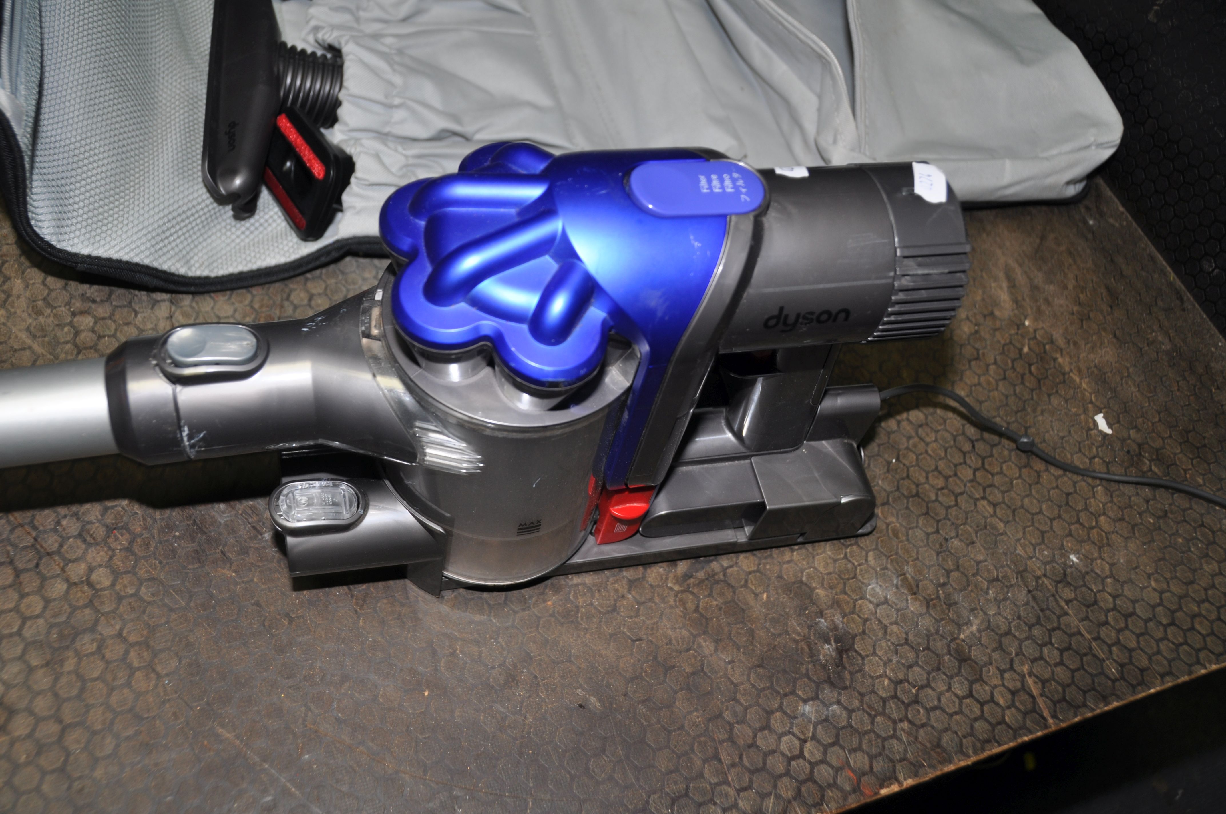 A DYSON DC35 CORDLESS HANDHELD VACUUM CLEANER with hanging bracket, charger and accessory bag - Image 3 of 6