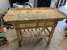 A PINE WORKBENCH with two drawers and under shelf width 121cm depth 55cm height 106cm