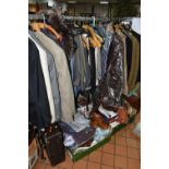 A QUANTITY OF LADIES AND GENTS CLOTHING, SUITCASES, BEDDING AND CLOTHING ACCESSORIES, the majority