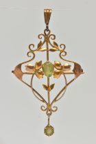 A YELLOW METAL PERIDOT SET LAVALIER PENDANT, open work floral pattern, set with a central oval cut