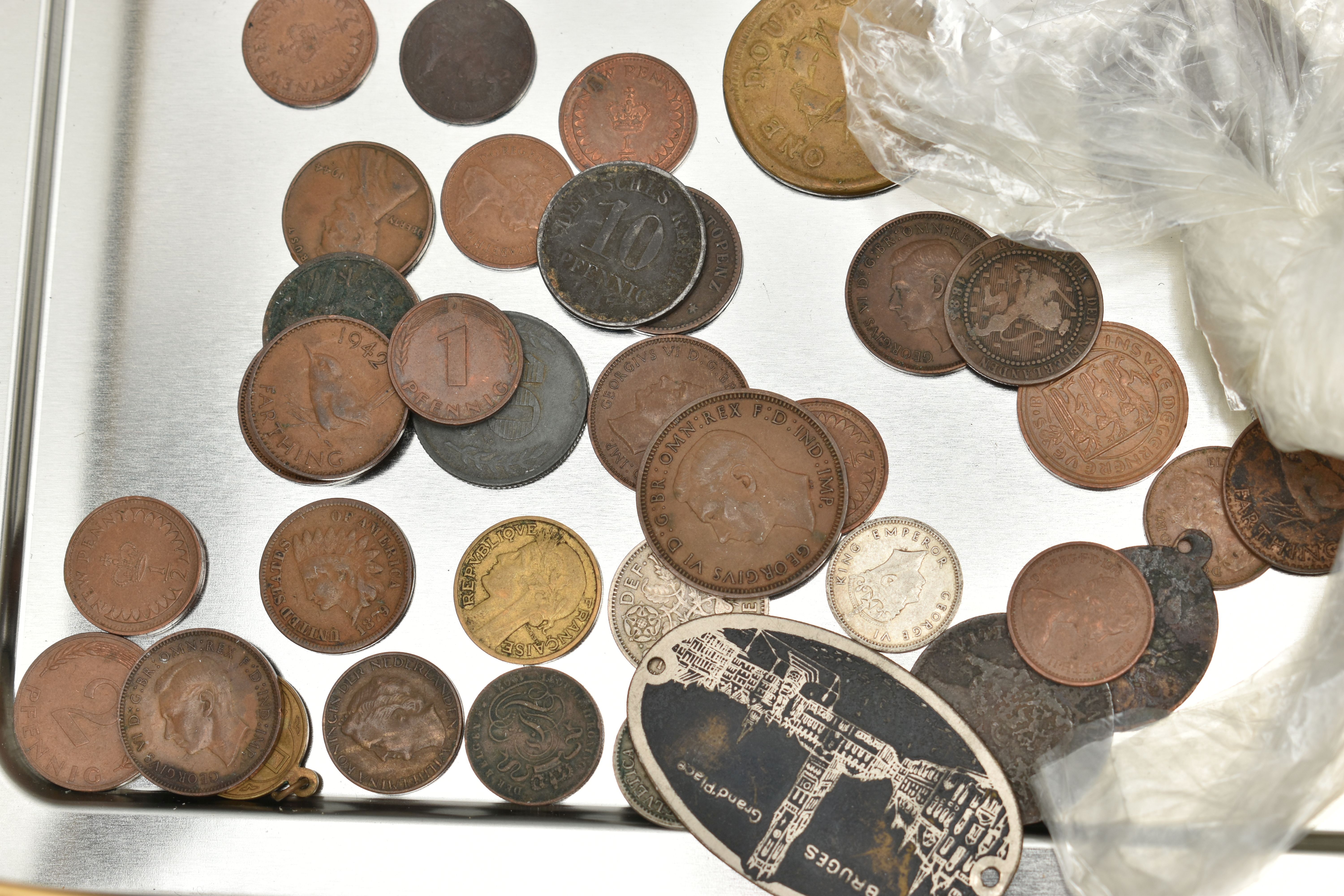A TIN CONTAINING MIXED WORLD COINS, to include 1890s Japan One Yen, Silver Rupee Hyderabad, 1900 - Image 7 of 8