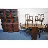 A 20TH CENTURY MAHOGANY OVAL EXTENDING DINING TABLE, with one additional leaf, open length 213cm x