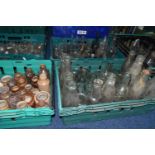 FIVE CRATES OF VINTAGE GLASS BOTTLES AND STONEWARE, to include a collection of over one hundred