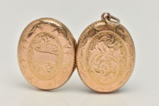 A YELLOW METAL OVAL LOCKET PENDANT, floral and foliate pattern with vacant cartouche, opens to