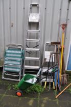 THREE ALUMINIUM STEP LADDERS, two folding garden chairs and a selection of garden tools