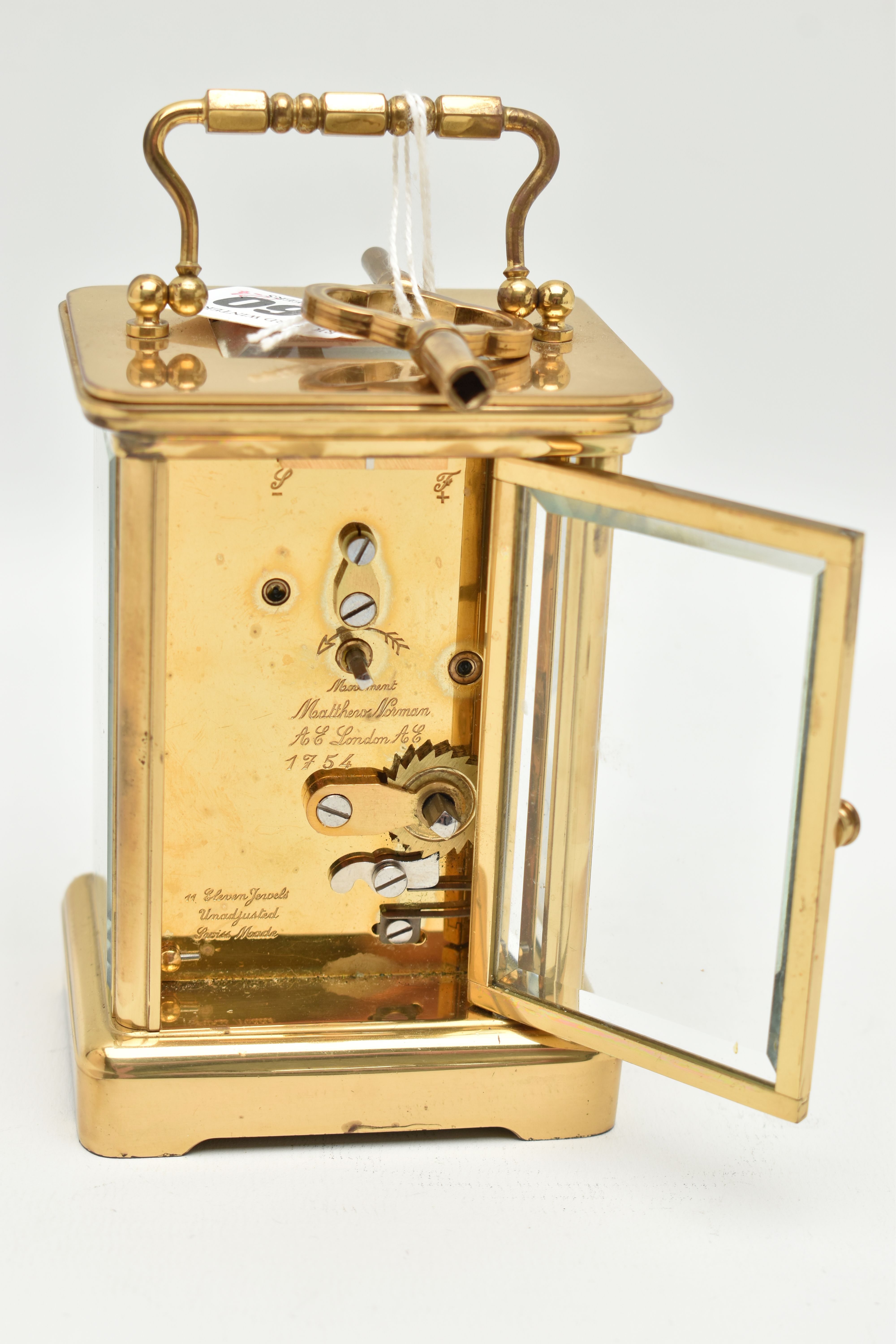 A 'MATTHEW NORMAN' CARRIAGE CLOCK, key wound, white Roman numeral dial signed 'Matthew Norman, - Image 4 of 4