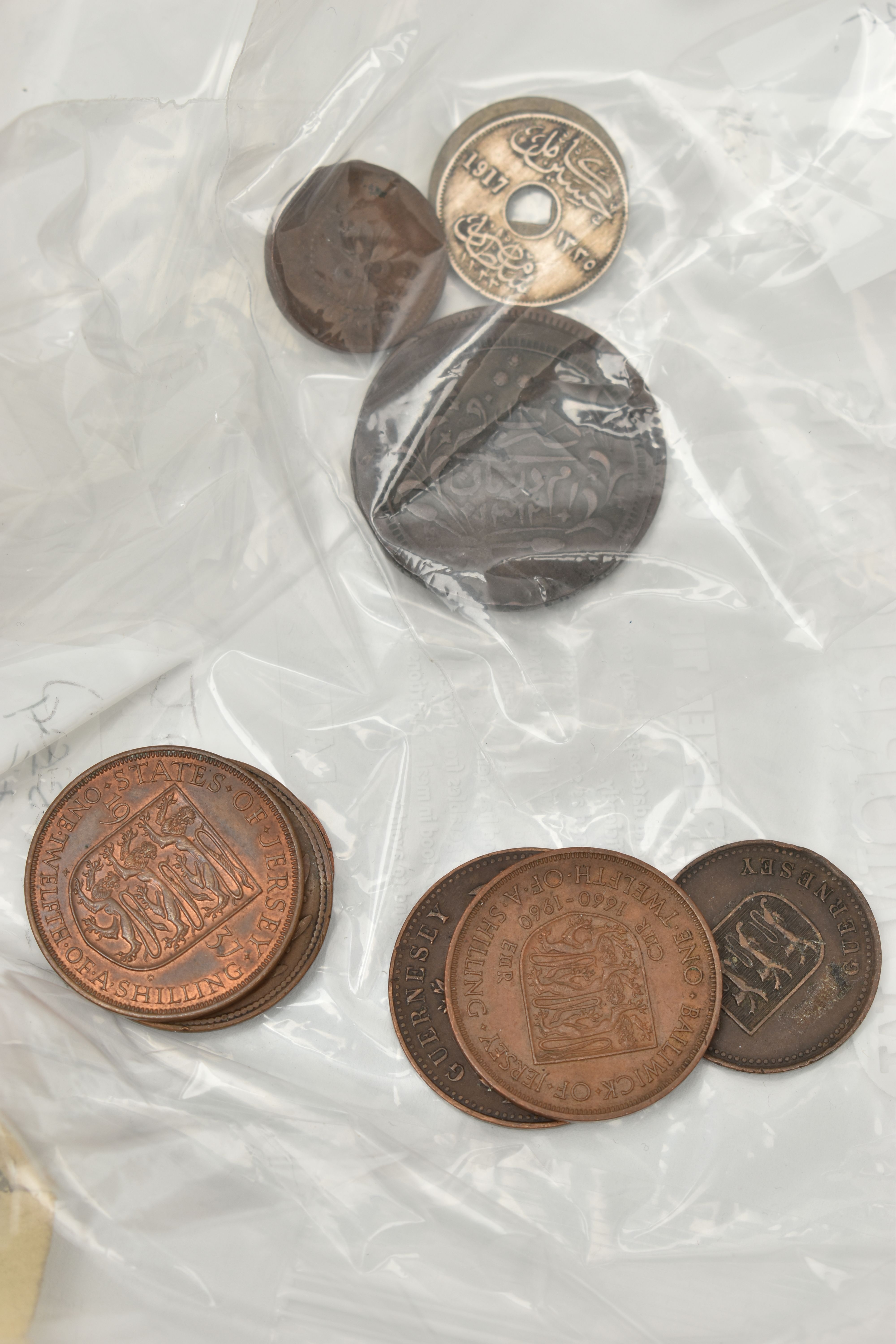 A TIN CONTAINING MIXED WORLD COINS, to include 1890s Japan One Yen, Silver Rupee Hyderabad, 1900 - Image 5 of 8