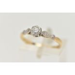 A YELLOW AND WHITE METAL DIAMOND SINGLE STONE RING, illusion set round brilliant cut diamond,