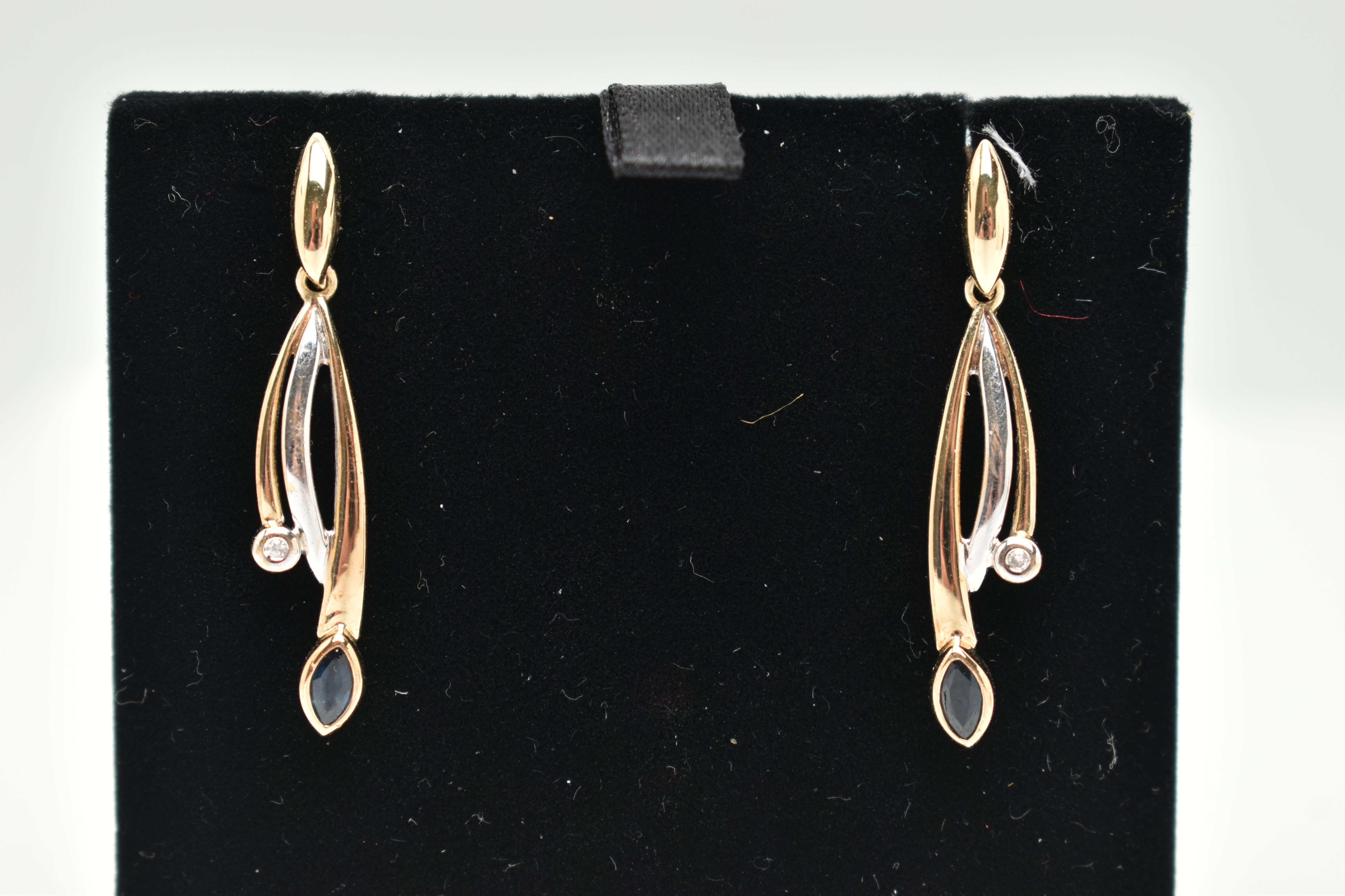 A BOXED PAIR OF 9CT GOLD SAPPHIRE AND DIAMOND EARRINGS, drop earrings each set with a marquise cut