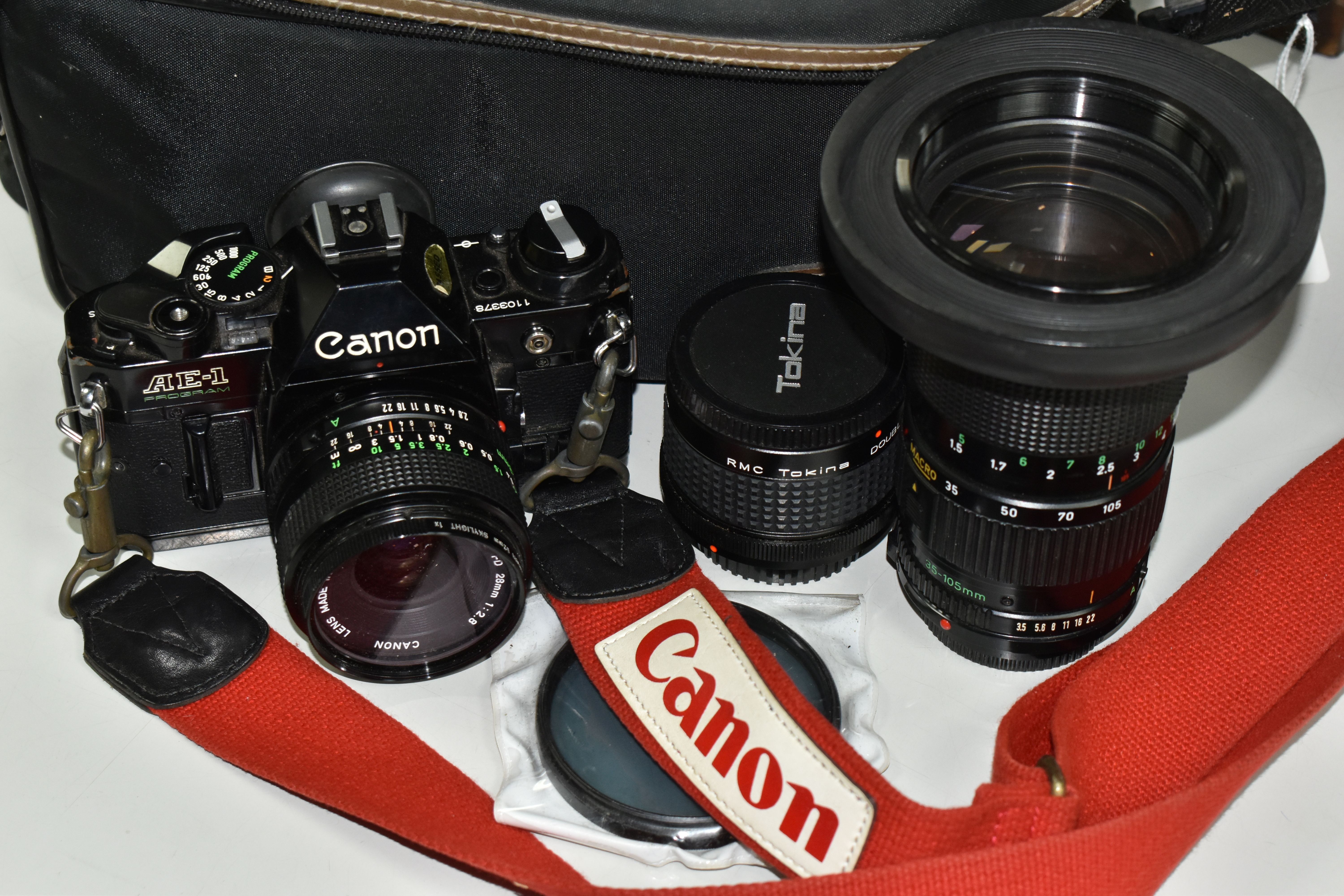 CANON PHOTOGRAPHIC EQUIPMENT ETC, comprising a Canon AE-1 Program 35mm SLR camera body, Canon 35-105