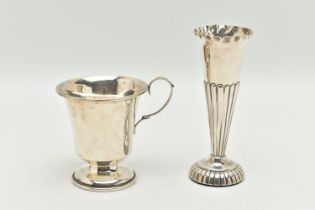 TWO ITEMS OF SILVER, to include a tapered stop reeded pattern posy vase, on a round weighted base,