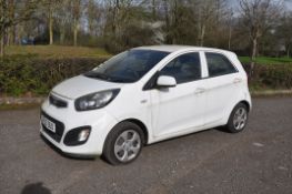 A 2013 KIA PICANTO 5 DOOR HATCHBACK in white, first registered 23/03/2013 under number FE13 OUO,