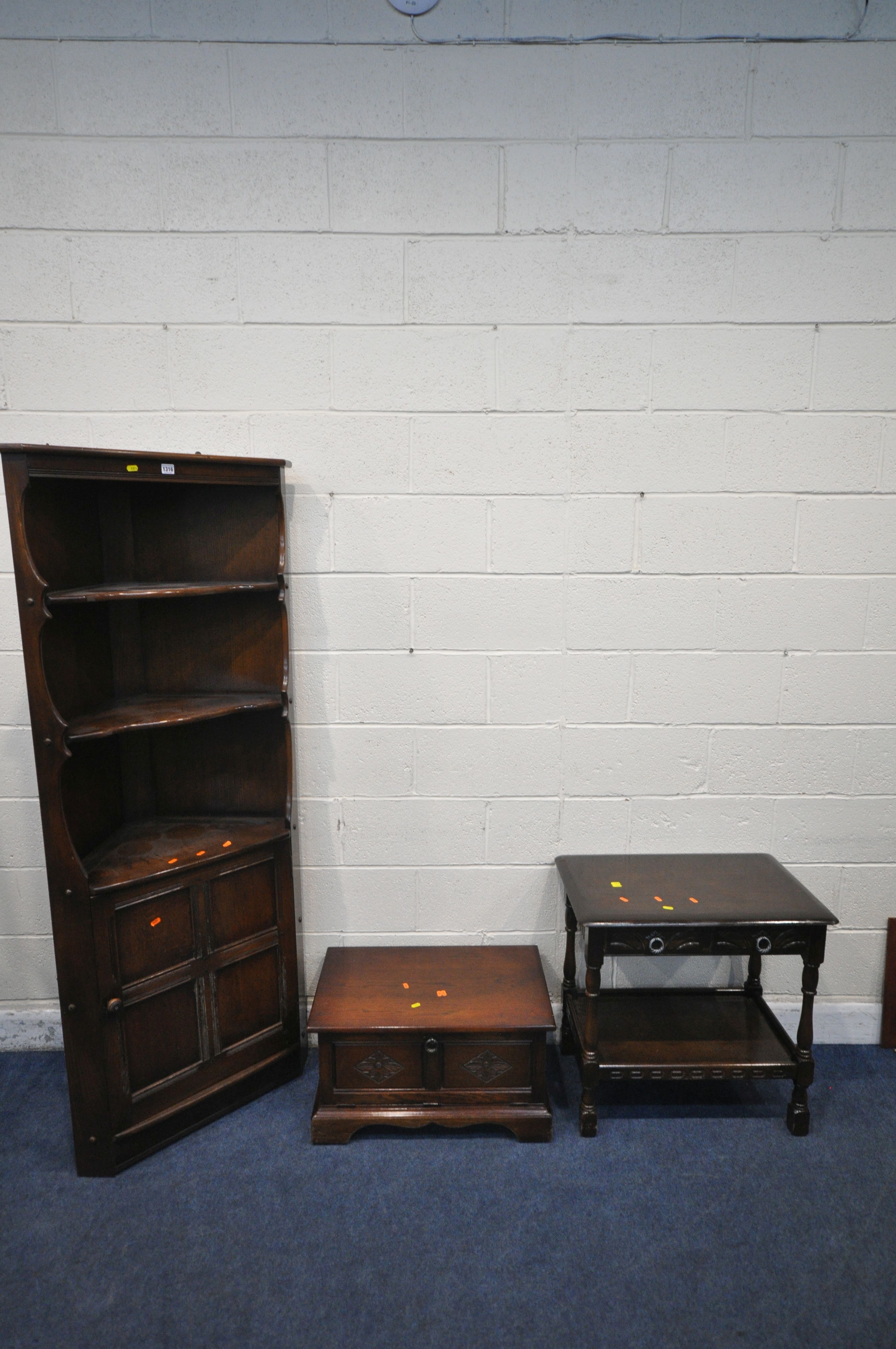 AN ERCOL ELM AND BEECH OLD COLONIAL CORNER CUPBOARD, width 76cm x depth 42cm x height 184cm, an