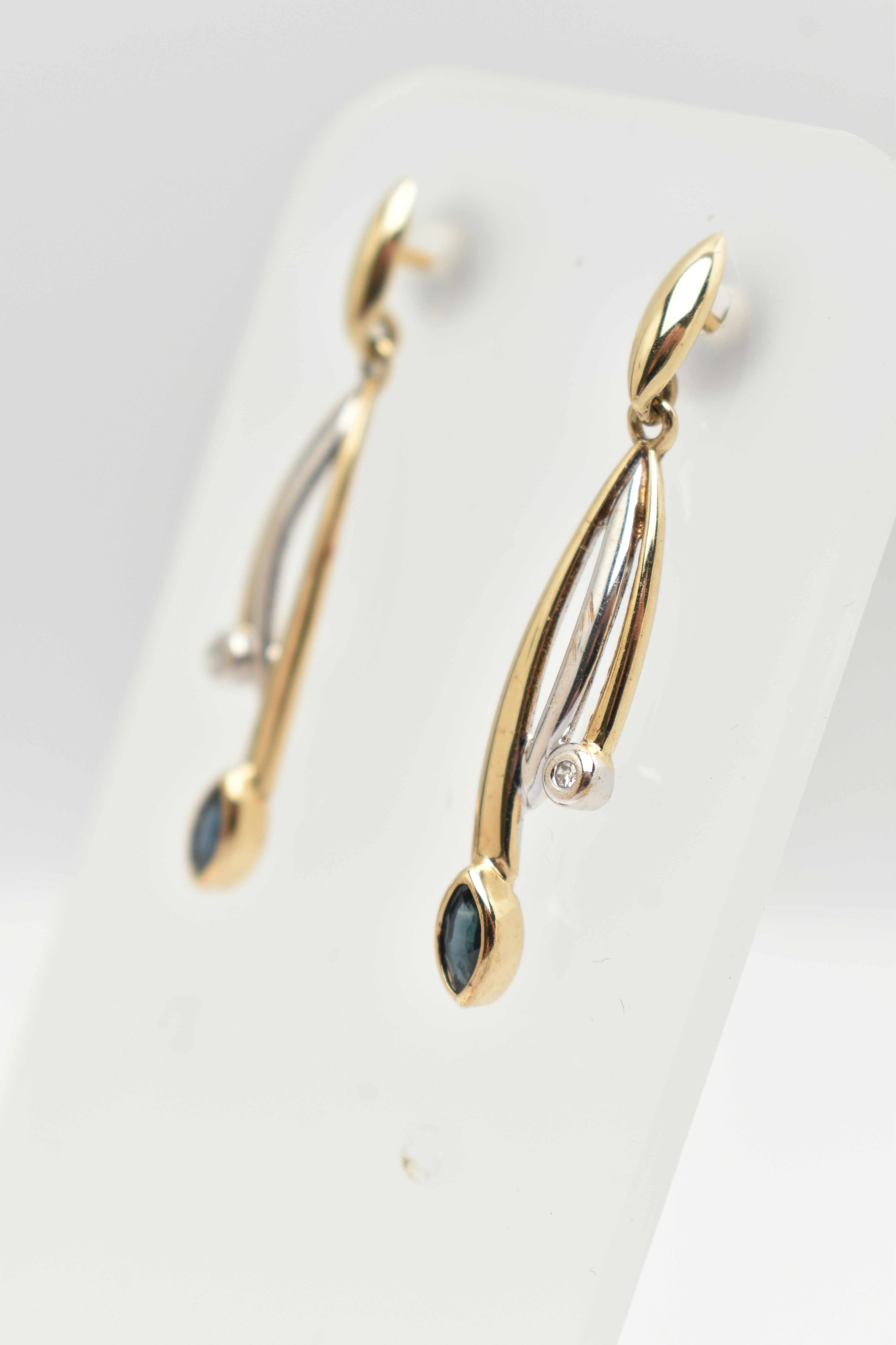 A BOXED PAIR OF 9CT GOLD SAPPHIRE AND DIAMOND EARRINGS, drop earrings each set with a marquise cut - Image 4 of 4