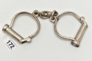 A PAIR OF 'HIATT BEST' HANDCUFFS, D shaped handcuffs, signed 'Hiatt Best warranted Wrought 24' (