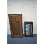 A 20TH CENTURY OAK LINENFOLD SINGLE DOOR WARDROBE, width 96cm x depth 43cm x height 178cm, along