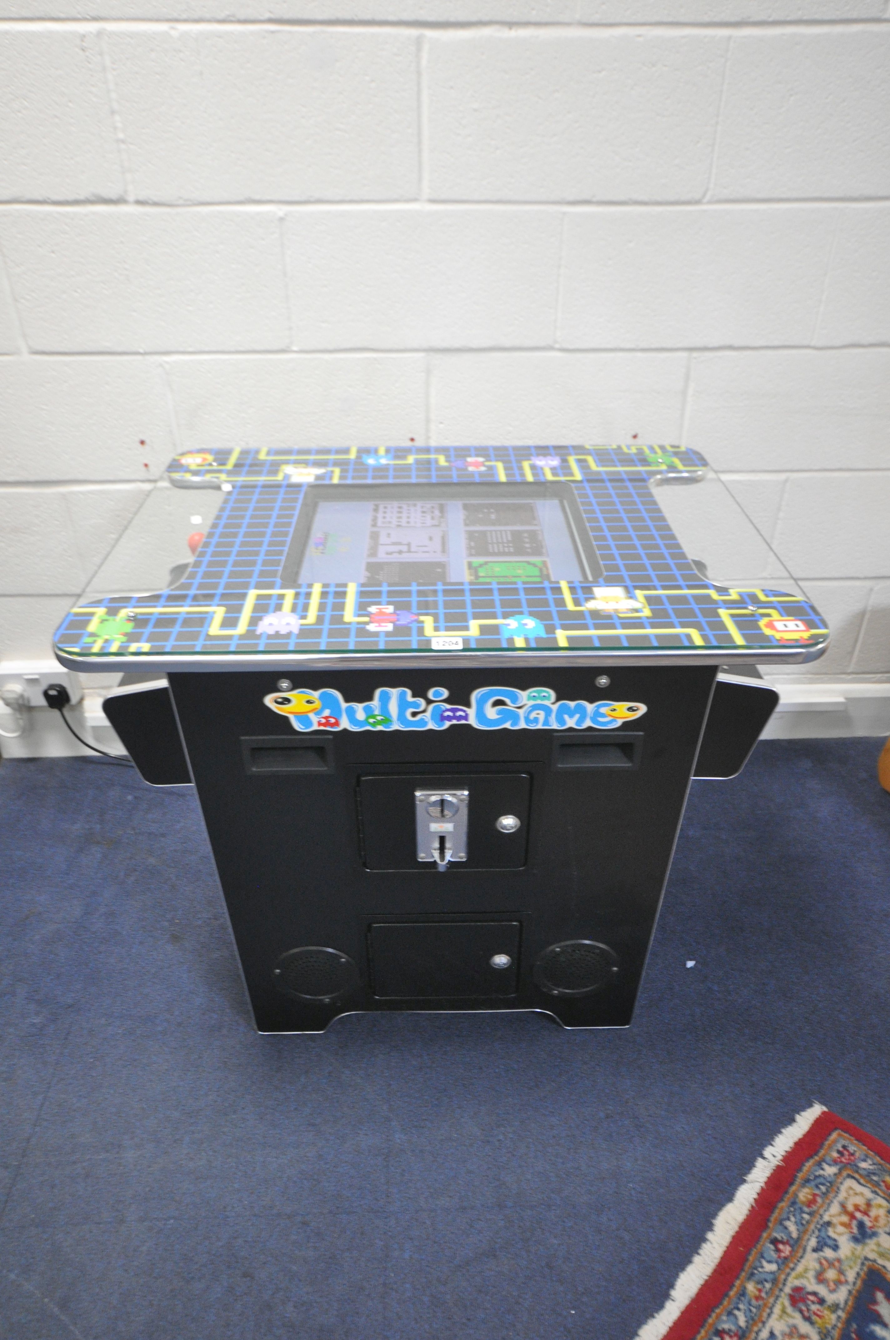 A RETRO MULTI-GAME TWO PLAYER ARCADE MACHINE, with 60 different programmed games, ranging from