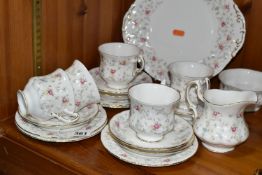 A PARAGON 'FIRST CHOICE' PATTERN TEA SET, comprising cake plate, five cups, sugar bowl, milk jug,