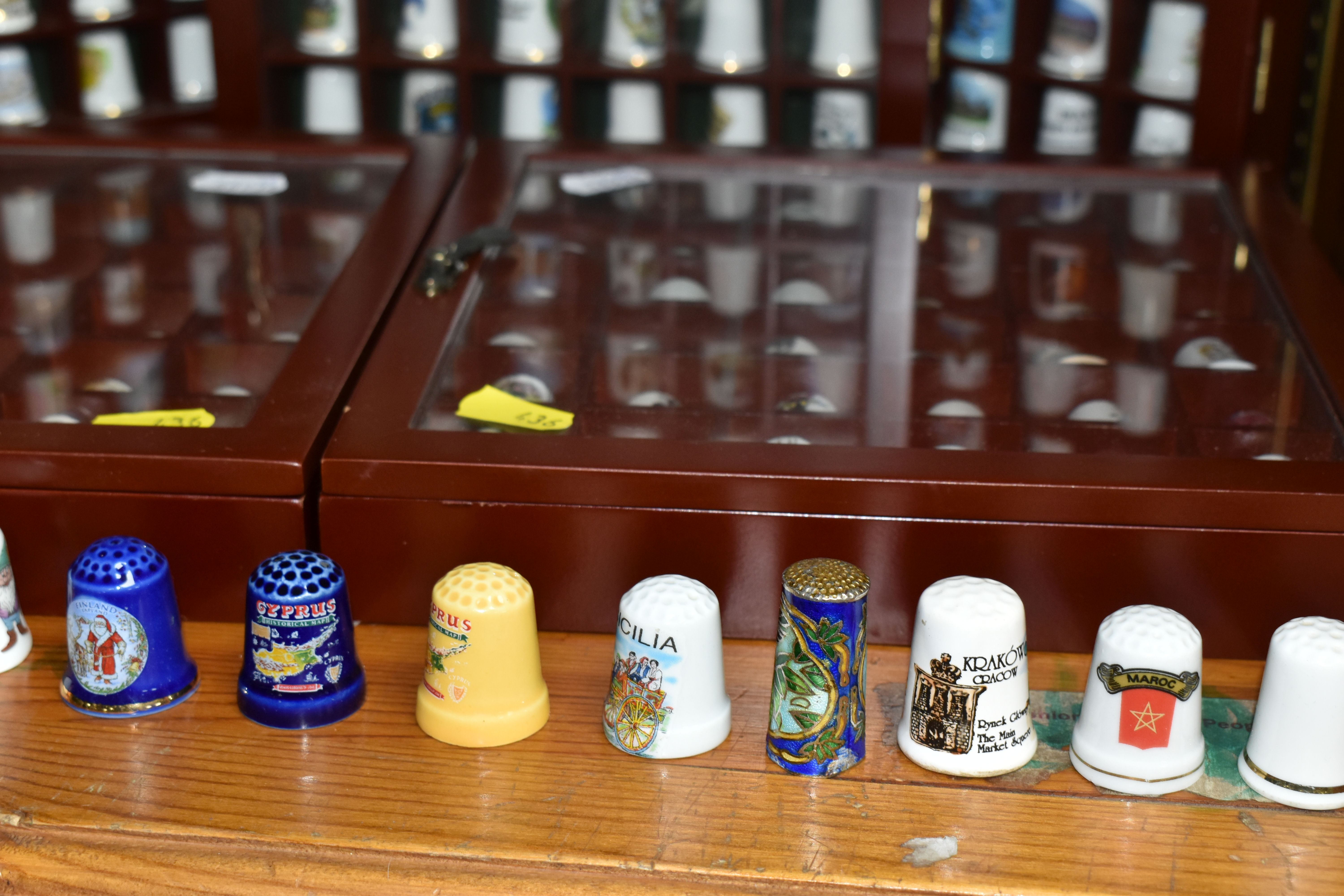 A COLLECTION OF THIMBLES, comprising seven wooden display cabinets and approximately four hundred - Image 6 of 6