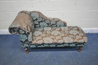 A MODERN CHAISE LOUNGE, with foliate upholstery (condition report: some discoloration)