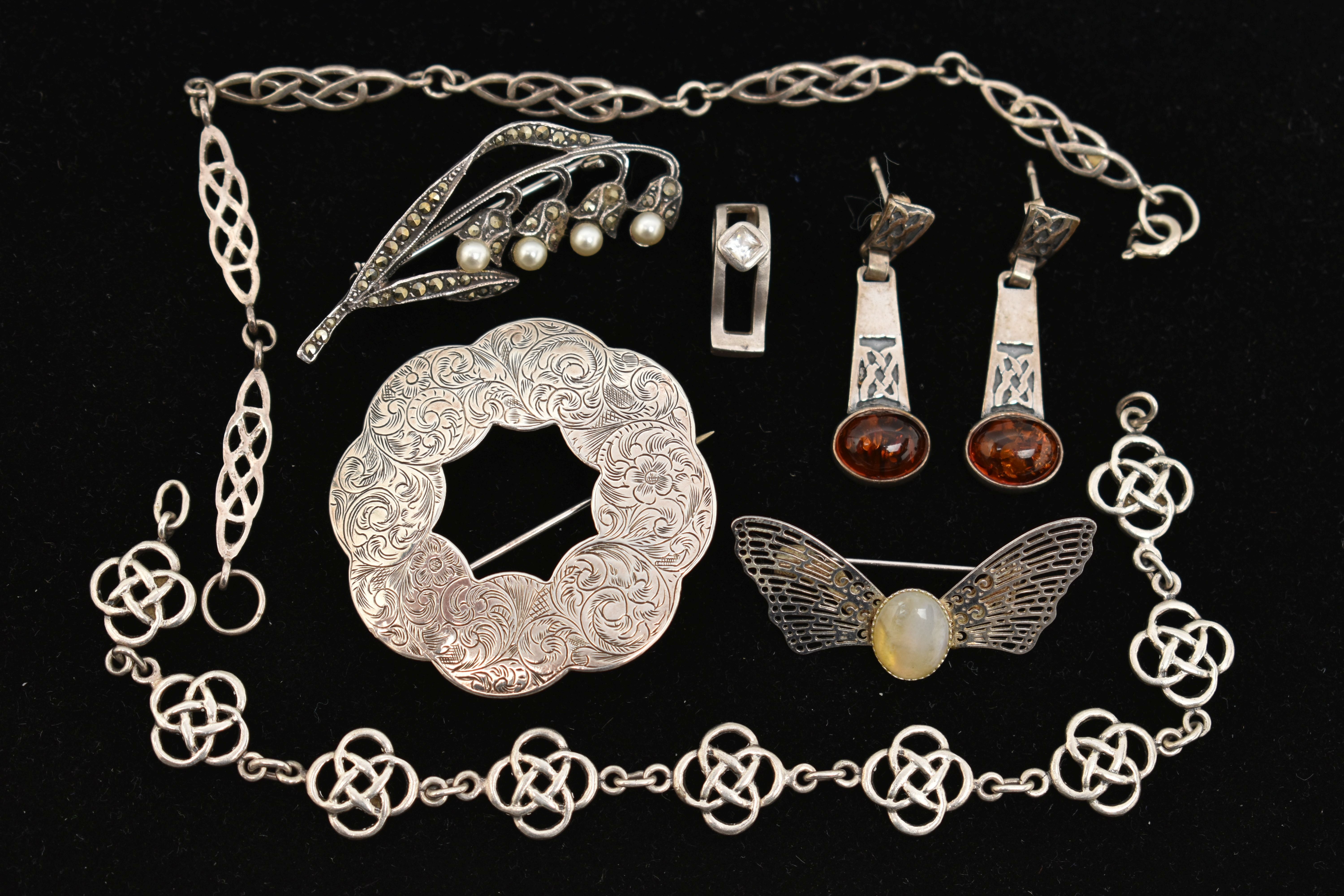 SEVEN PIECES OF WHITE METAL JEWELLERY, to include a pair of amber cabochon set drop earrings, post