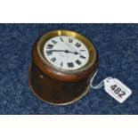 A SMALL CLOCK SWISS MADE FOR S.SMITH & SON LTD. 8-day motor clock in brass case, stamped 370, with