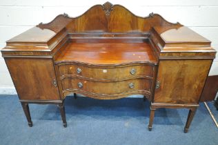 A VICTORIAN MAHOGANY TWIN PEDESTAL SIDEBOARD, with a raised back, two doors flanking two