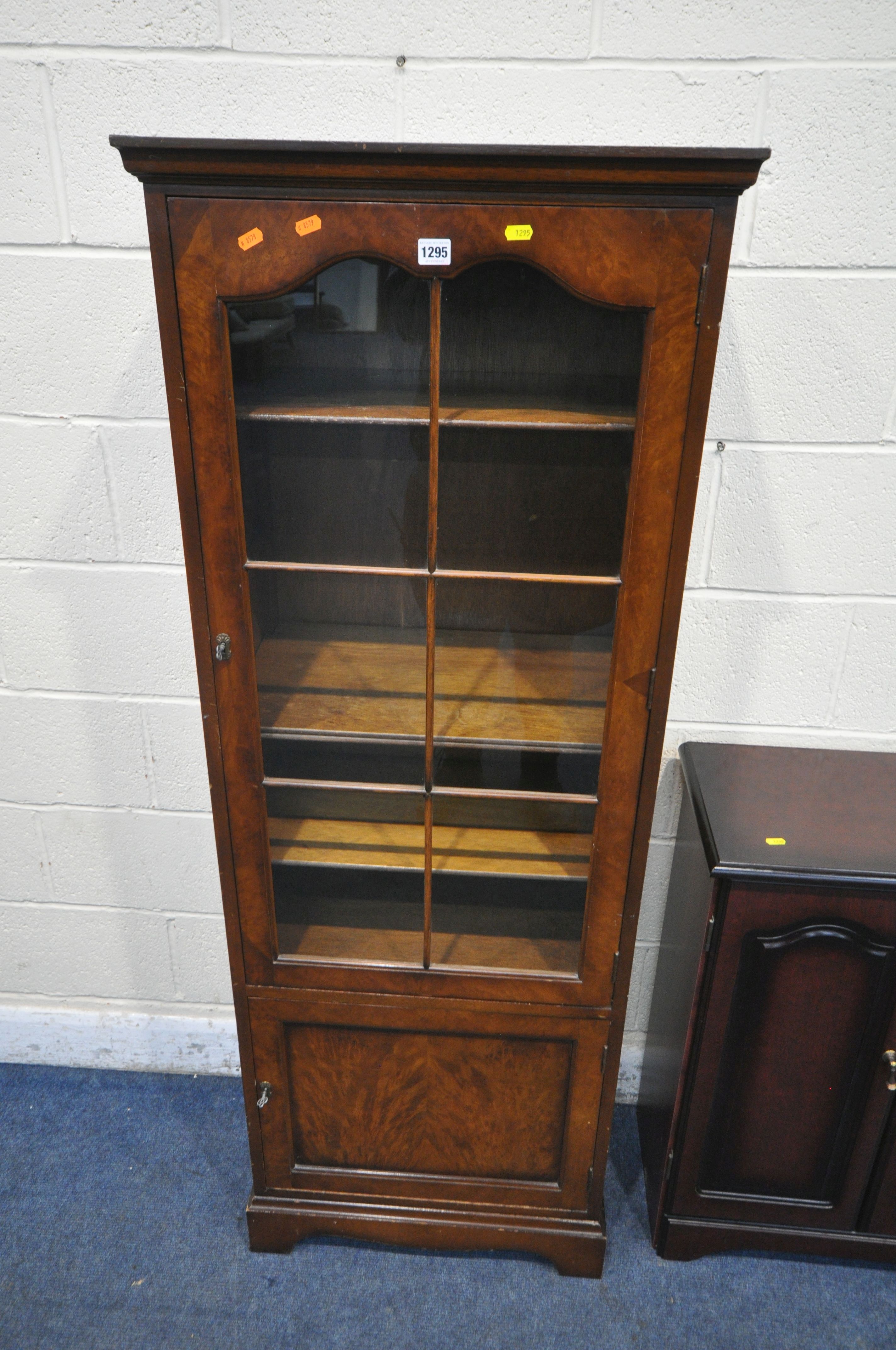 A LATE 20TH CENTURY MAHOGANY BOOKCASE, with a single glazed door, above a smaller cupboard door, - Image 2 of 2