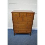 A REPRODUCTION HARDWOOD CHEST OF EIGHT ASSORTED DRAWERS, on block legs, width 90cm x depth 53cm x