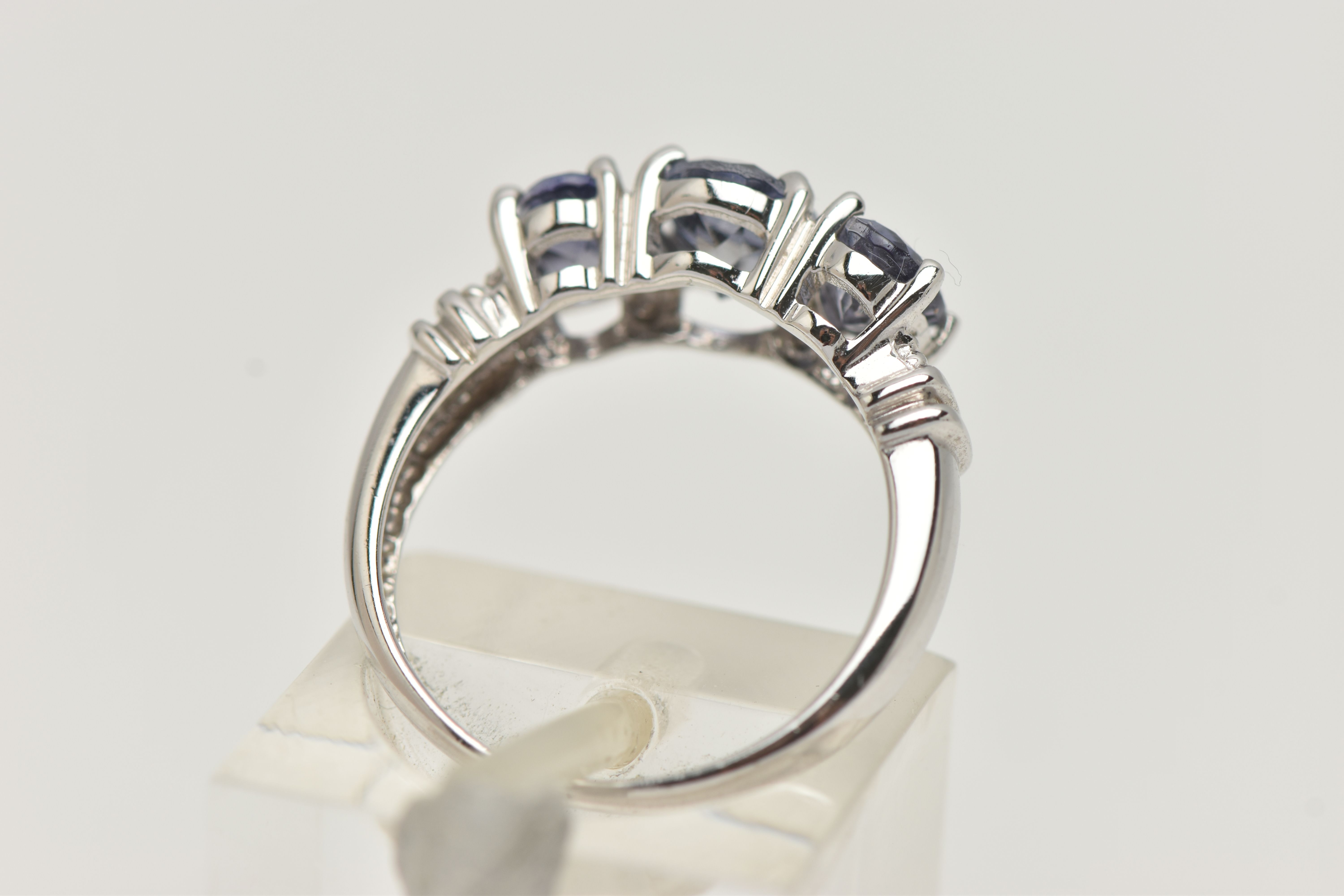 A 9CT WHITE GOLD TANZANITE RING, set with three oval cut tanzanite, each in a four claw setting, - Image 3 of 4