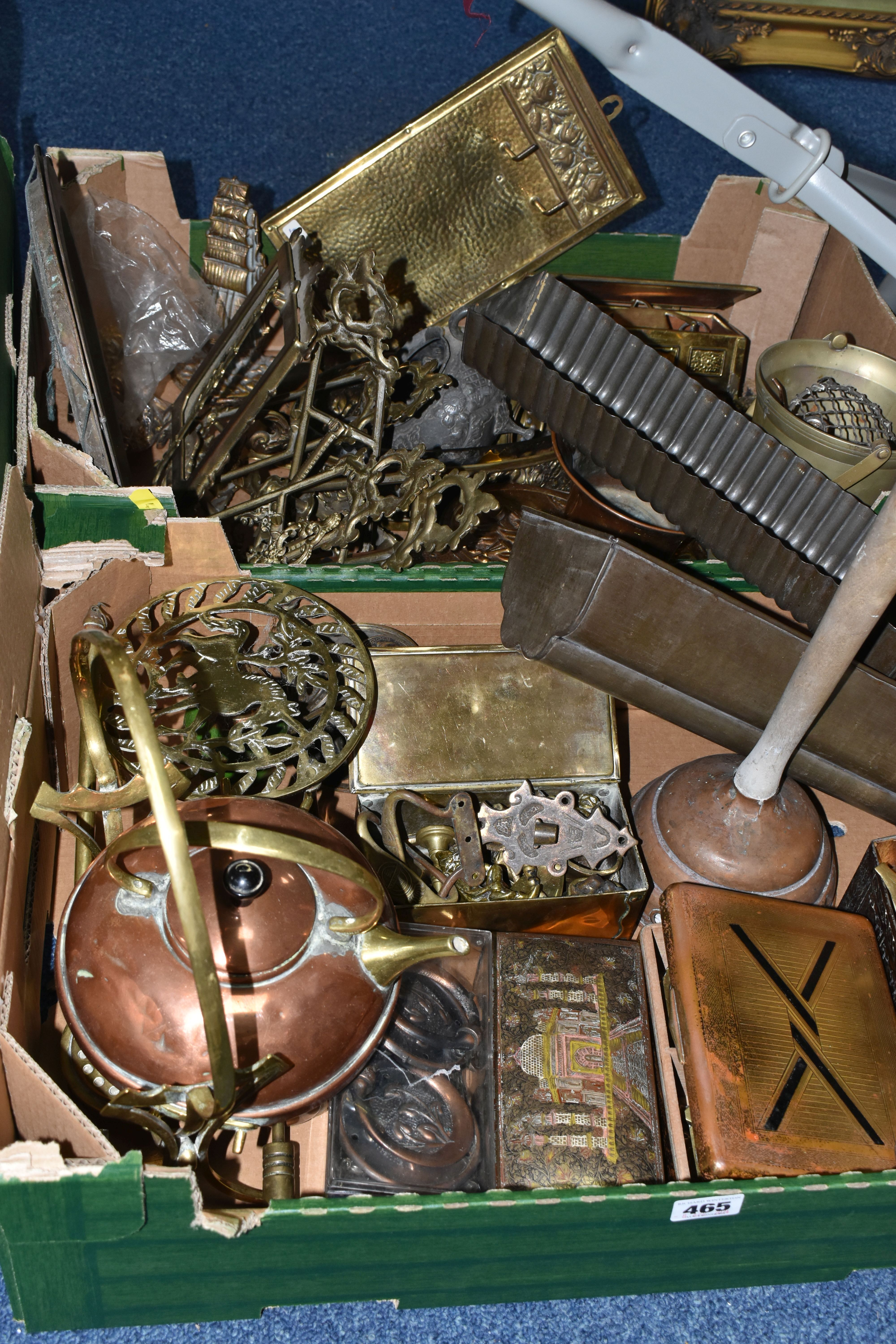 TWO BOXES AND LOOSE METALWARE, to include a large circular Middle Eastern design brass serving