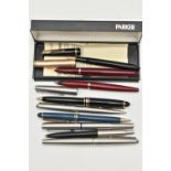 AN ASSORTMENT OF PENS, to include to 'Parker' fountain pens with yellow metal nibs, one stamped 14k,