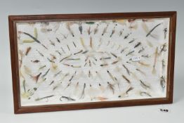 A DISPLAY BOX OF VINTAGE SALMON AND TROUT FLIES, a quantity of flies are mounted into a glass topped