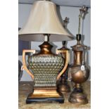 THREE BRONZED TABLE LAMPS, comprising a pair of bronzed urn style lamps missing shades, height
