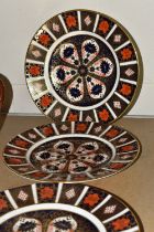 FOUR ROYAL CROWN DERBY IMARI 1128 PATTERN DINNER PLATES, bearing Roman numerals XLIII, XLIV and XLV,