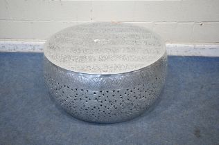 A CIRCULAR STEEL COFFEE TABLE, with repeating foliate design, and pierced sides, diameter 100cm x