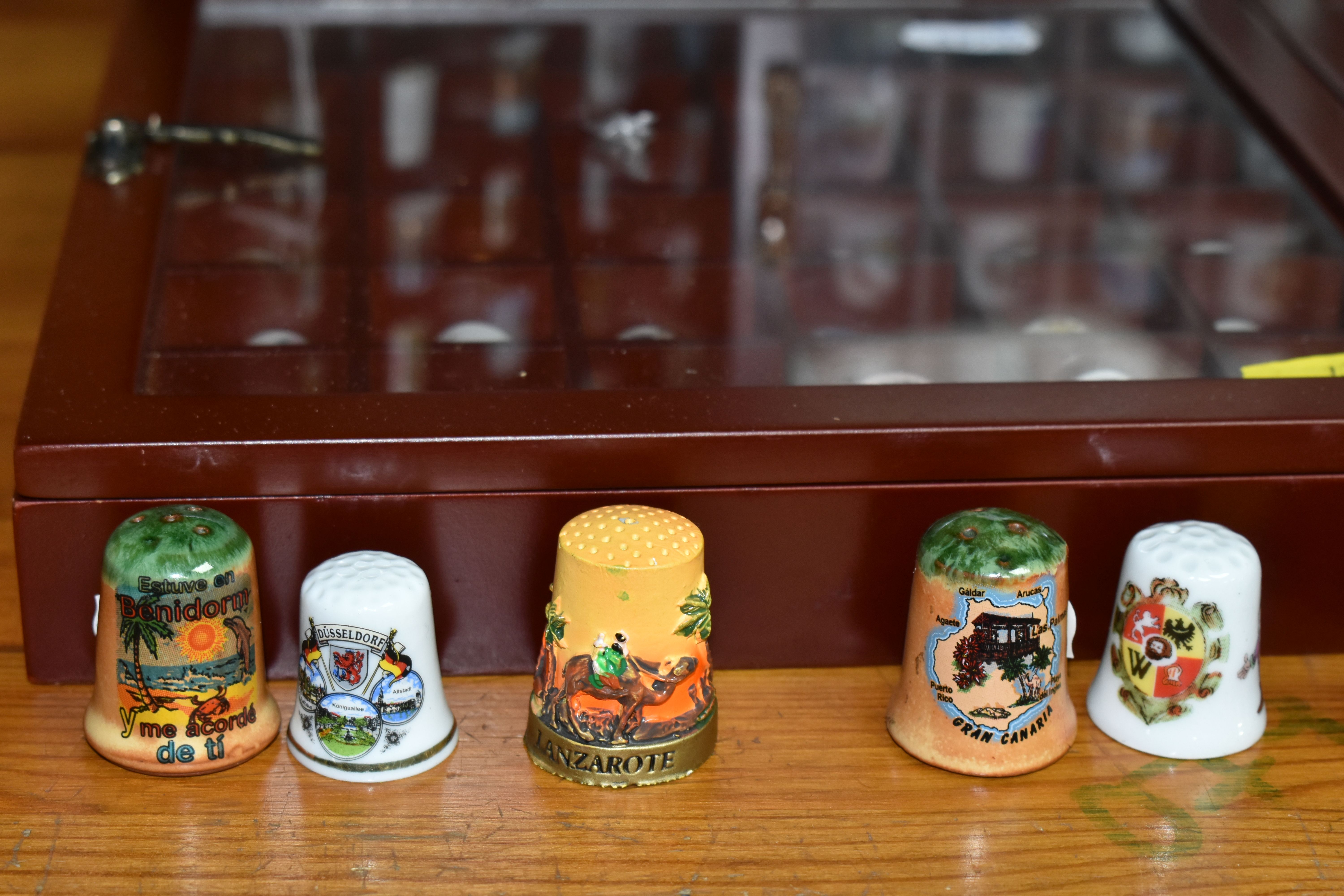 A COLLECTION OF THIMBLES, comprising seven wooden display cabinets and approximately four hundred - Image 5 of 6