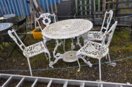 A WHITE PAINTED CAST ALUMINIUM GARDEN TABLE, table diameter 92cm, and four chairs (5)
