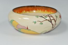 A CLARICE CLIFF BIZARRE SPIRE PATTERN BOWL, shape no.55, the interior with brown, orange and