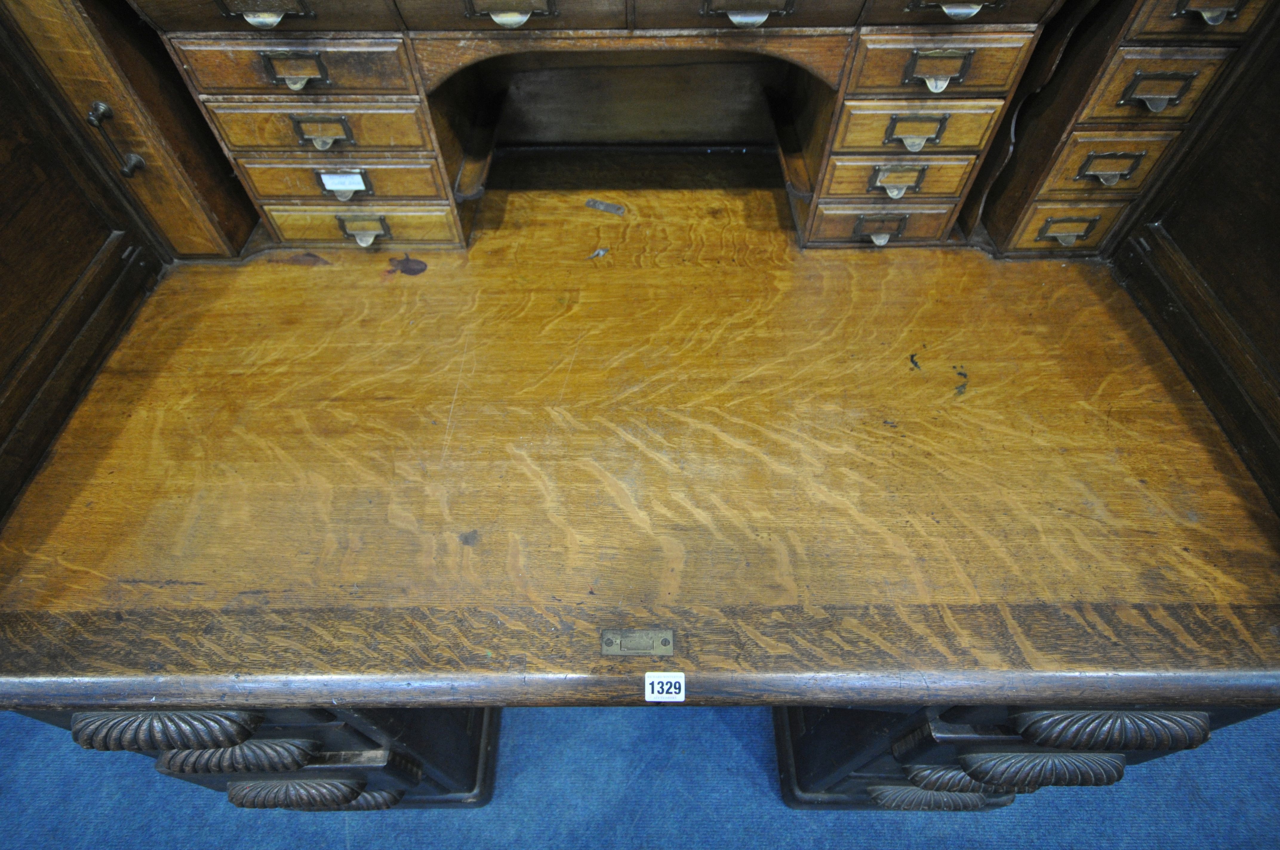 AN EARLY 20TH CENTURY OAK ROLL TOP DESK, enclosing a fitted interior, on two pedestals, each with - Image 5 of 8