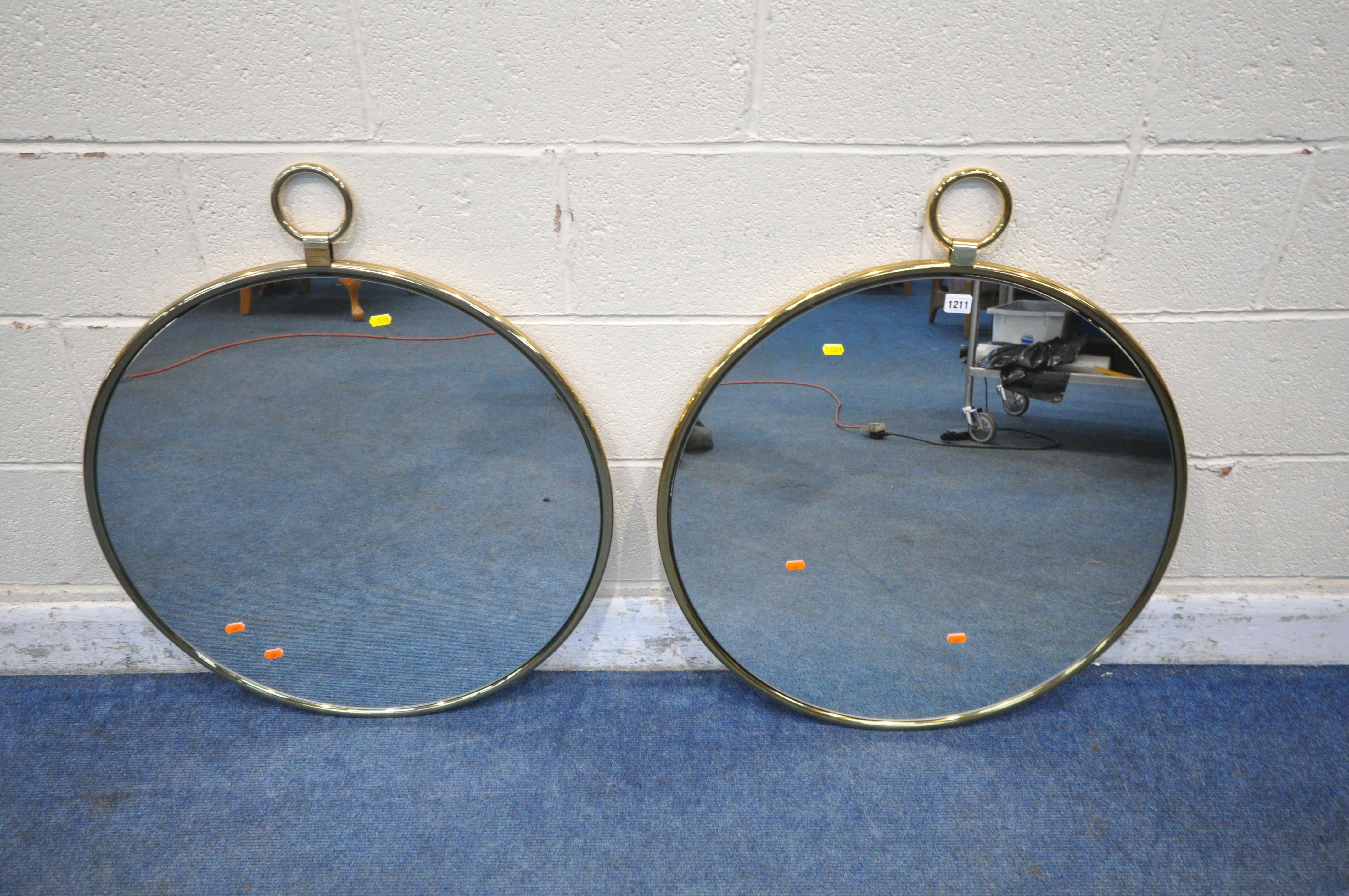 A PAIR OF NEXT BRASSED PENDANT STYLE CIRCULAR MIRRORS, diameter 72cm x height to fitting 84cm (