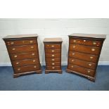 A PAIR OF STAG MAHOGANY CHESTS OF FIVE DRAWERS, width 82cm x depth 46cm x height 116cm, along with a