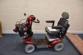 A ROMA MEDICAL CADIZ FOUR WHEELED MOBILITY SCOOTER with charger cover but no key (untested)