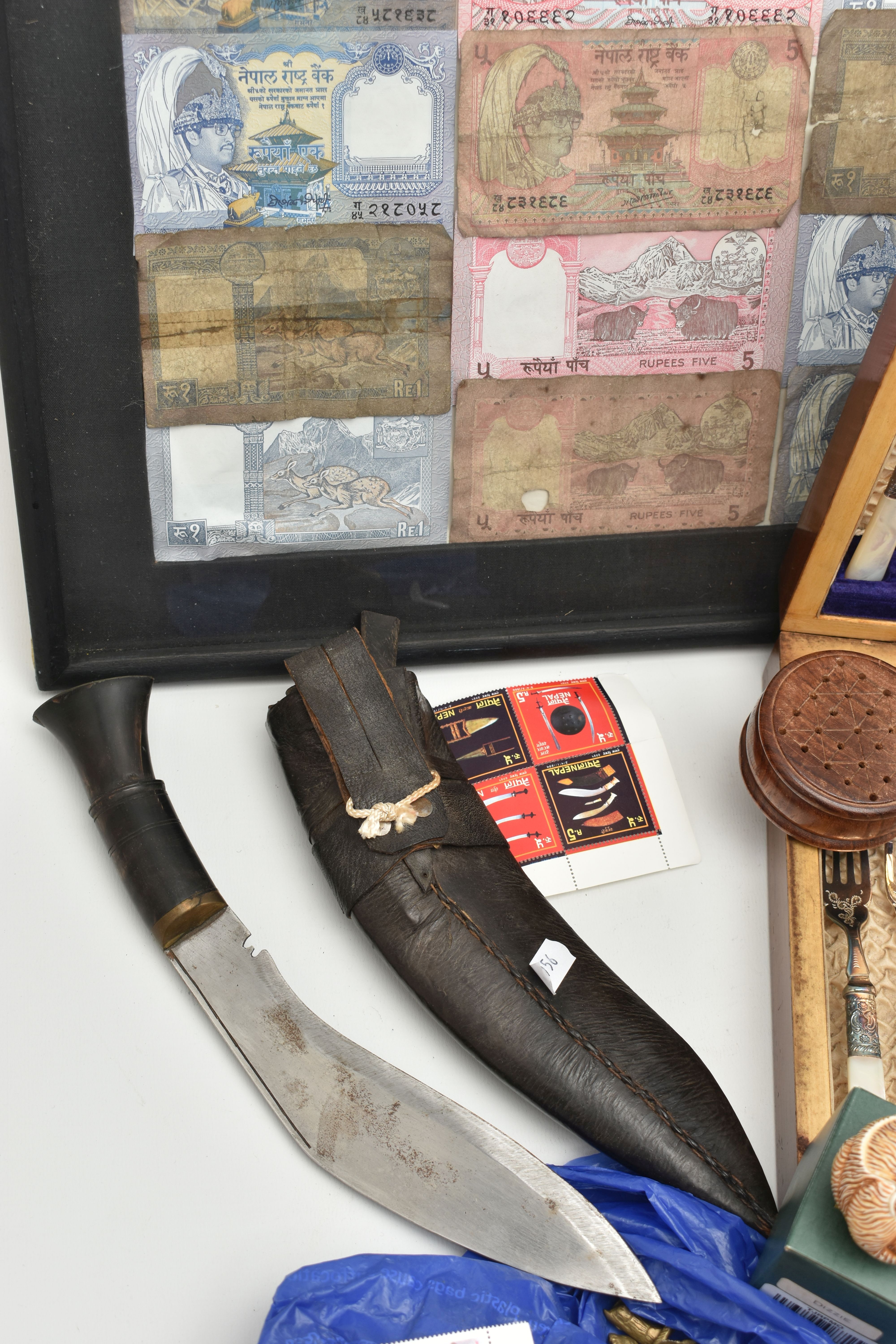 A BOX OF MISCELLANEOUS ITEMS, to include a kukri knife, with leather sheath and smaller knife, - Image 6 of 7