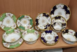 A GROUP OF COALPORT 'BATWING' TEA WARE, comprising in navy blue batwing pattern: a teacup (sounds