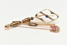 TWO BROOCHES AND TWO STICKPINS, to include an openwork diamond shape brooch set with a central