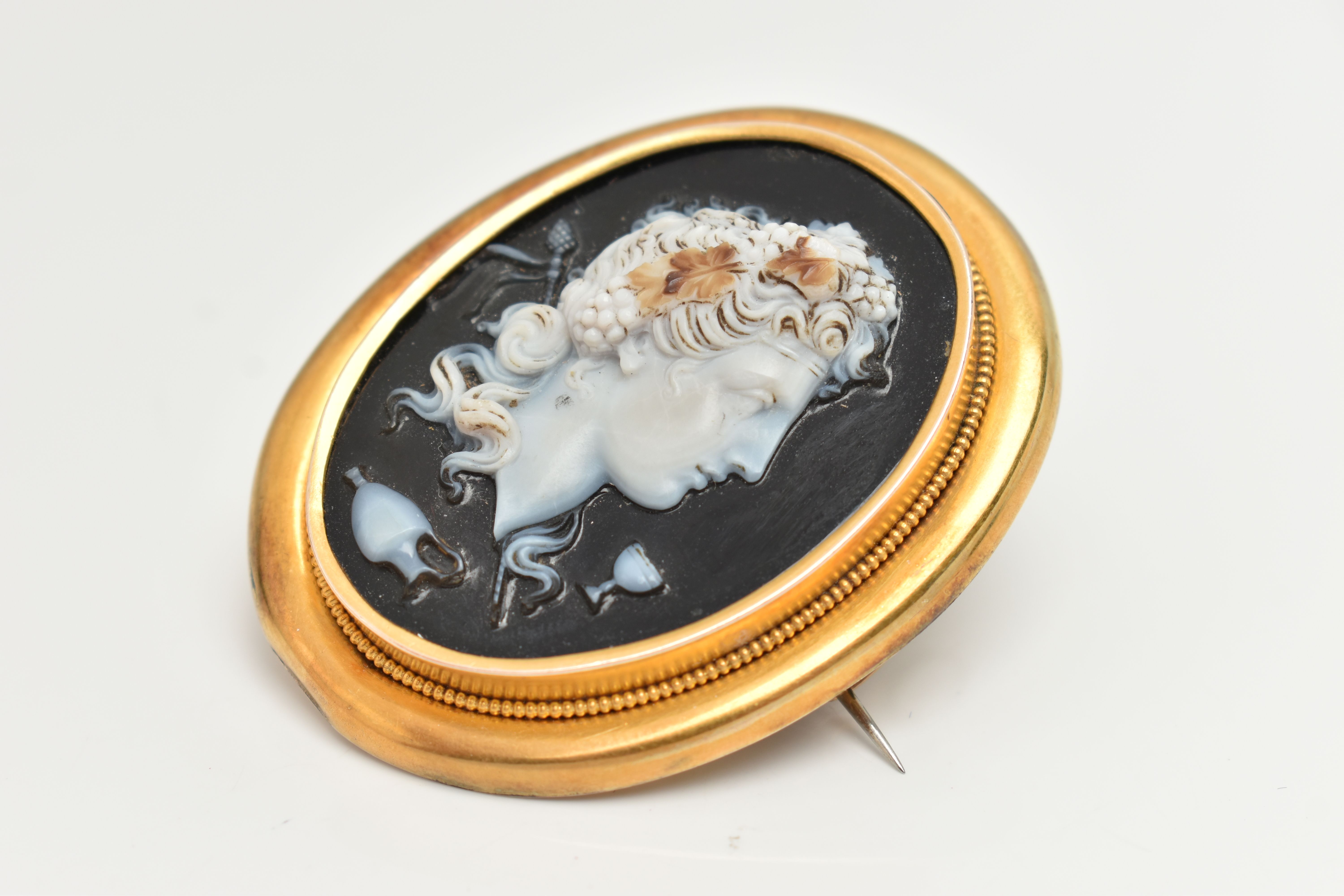 A LARGE YELLOW METAL CAMEO BROOH, glass cameo depicting a lady in profile with grapes in hair, - Image 3 of 4